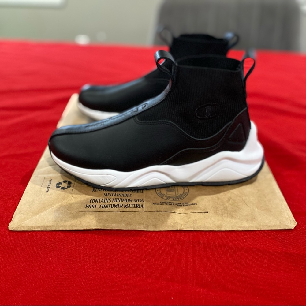 Like new champion slide on sneakers. Worn once, size 7.5